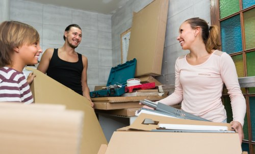 Packed moving boxes and wrapping materials prepared for a Barnet home move