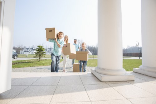 Office boxes and desks arranged for a phased business relocation